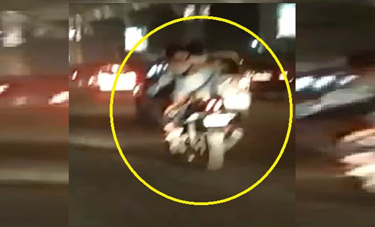 VIDEO : भरधाव बाईक, पेट्रोल टँकवर तरुणी, चालत्या गाडीवर रोमान्स