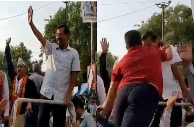 तरुणाने रोड शो चालू असताना गाडीवर चढून केजरीवालांच्या कानशिलात लगावली