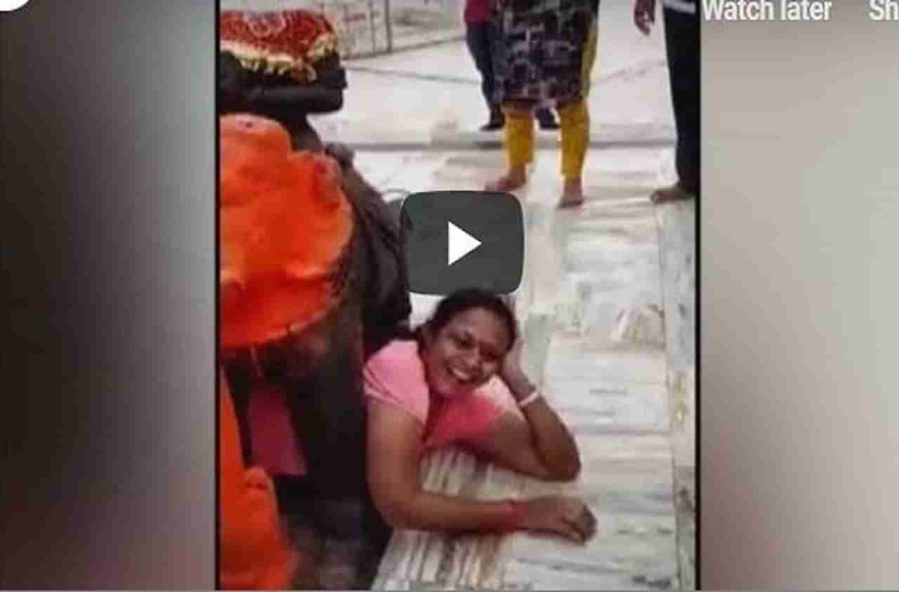 VIDEO : नवस फेडणारी महिला हत्तीच्या पोटाखाली अडकली, सेल्फीने फसली