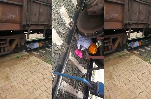 VIDEO : थकलेल्या आजोबांनी रेल्वेट्रॅकवरच ताणून दिली, रेल्वे आली, निघूनही गेली!