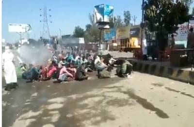 VIDEO : उत्तर प्रदेशात रोगापेक्षा इलाज भयंकर, पायपीट करणाऱ्या मजुरांवर एकत्र बसवून औषध फवारणी
