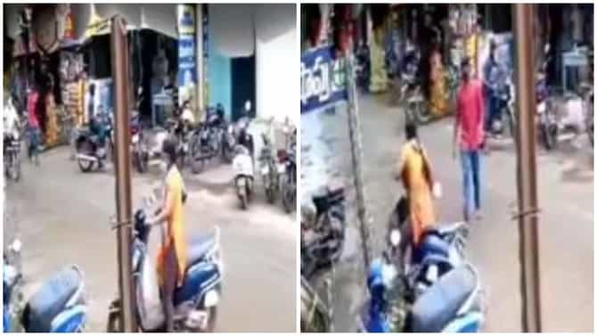 VIDEO | तरुणीनं ब्रेक समजून एक्सीलेटर फिरवलं, स्कुटी घेऊन पडताच लोक म्हणाले पापा की परी, रोड पर पड़ी