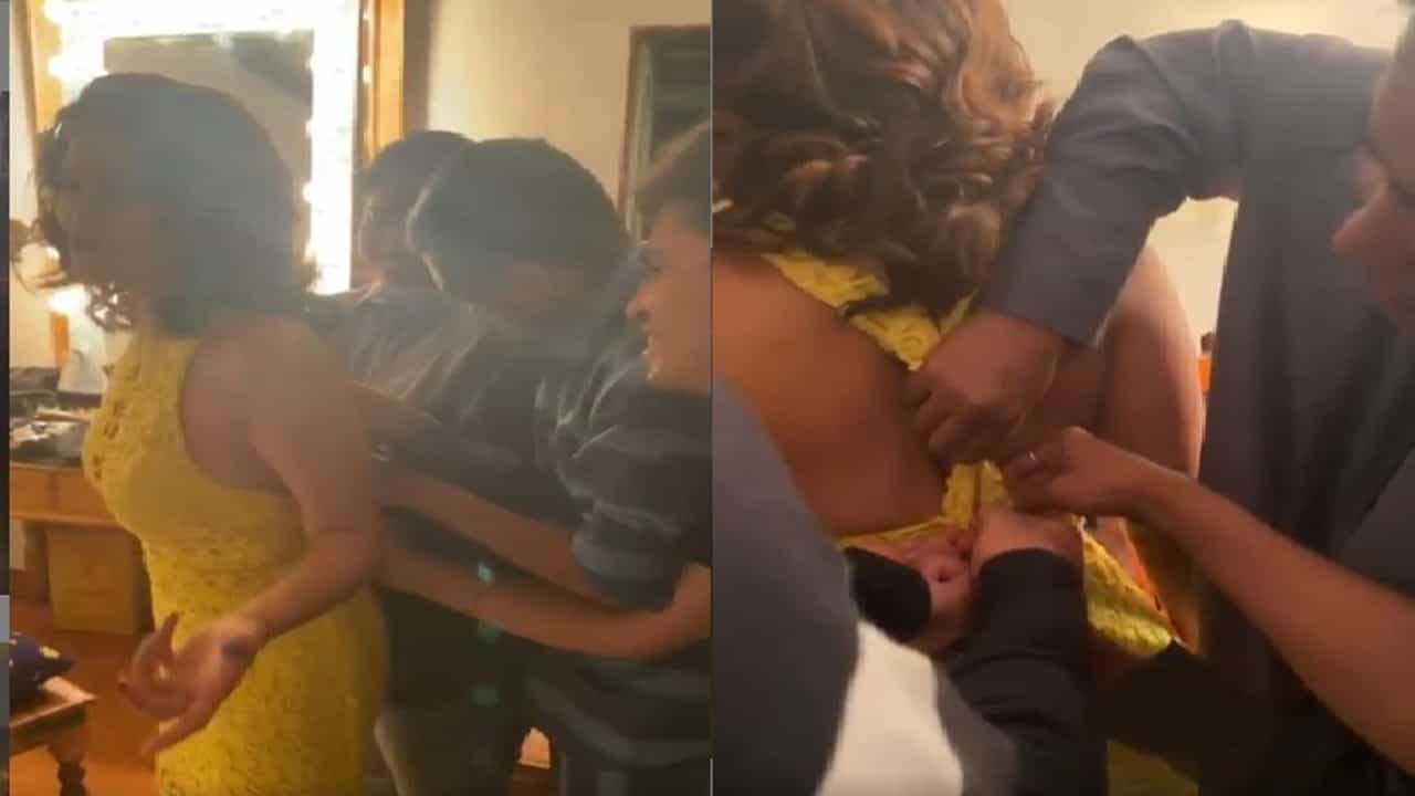 VIDEO | सनी लिओनीच्या गाऊनची चेन लावण्यासाठी चौघांचा आटापिटा