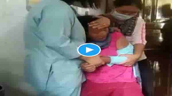 Video | लसीने भरलेले इंजेक्शन पाहून महिलेला फुटला घाम, मजेदार व्हिडीओ एकदा पाहाच