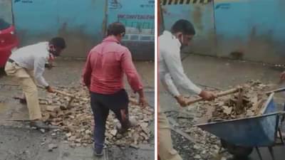 मुंबईत पालिकेच्या नाकर्तेपणामुळे वाहतूक पोलिसांवर रस्त्यावरील खड्डे भरण्याची वेळ