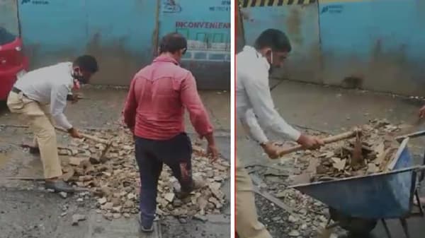 मुंबईत पालिकेच्या नाकर्तेपणामुळे वाहतूक पोलिसांवर रस्त्यावरील खड्डे भरण्याची वेळ