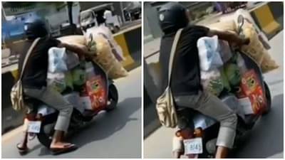 Video | इवल्याशा दुचाकीवर डोंगराएवढं सामान, हेवी ड्रायव्हरची हिम्मत एकदा पाहाच