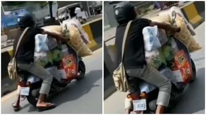 Video | इवल्याशा दुचाकीवर डोंगराएवढं सामान, हेवी ड्रायव्हरची हिम्मत एकदा पाहाच