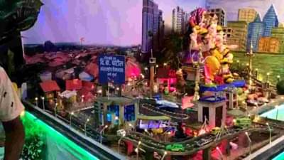 आसूडगावातील गणेश भक्तांनी साकारला नवी मुंबई विमानतळाचा देखावा, भूमिपुत्र गणेशभक्त दी बा पाटील यांच्या नावावर ठाम