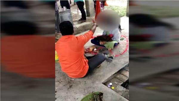 VIDEO | साताऱ्यात अल्पवयीन मुलीचे स्मशानभूमीत पूजन, मांडीत कोंबडा ठेवून मांत्रिकाकडून पूजा