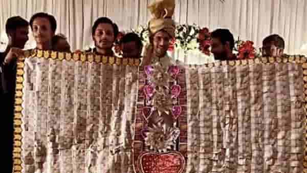 नवरदेवाच्या गळ्यात हे भली मोठी नोटांची माळ, फोटो व्हायरल!
