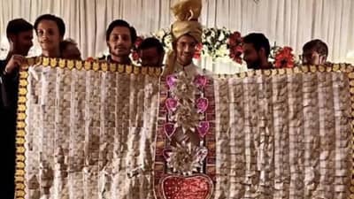 नवरदेवाच्या गळ्यात हे भली मोठी नोटांची माळ, फोटो व्हायरल!