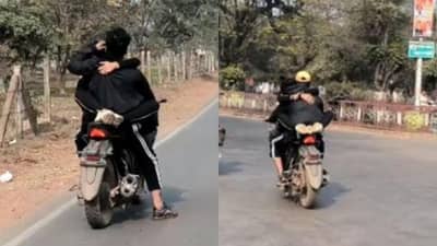 चालत्या बाईकवर रोमान्स करणं कपलला पडलं महागात; पोलिसांकडून कारवाई
