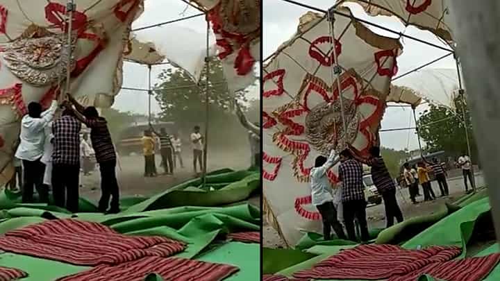 वादळात मंडप उडाला, तरी भर पावसात पठ्ठ्यांचं आंदोलन सुरूच वादळात मंडप उडाला, तरी भर पावसात पठ्ठ्यांचं आंदोलन सुरूच