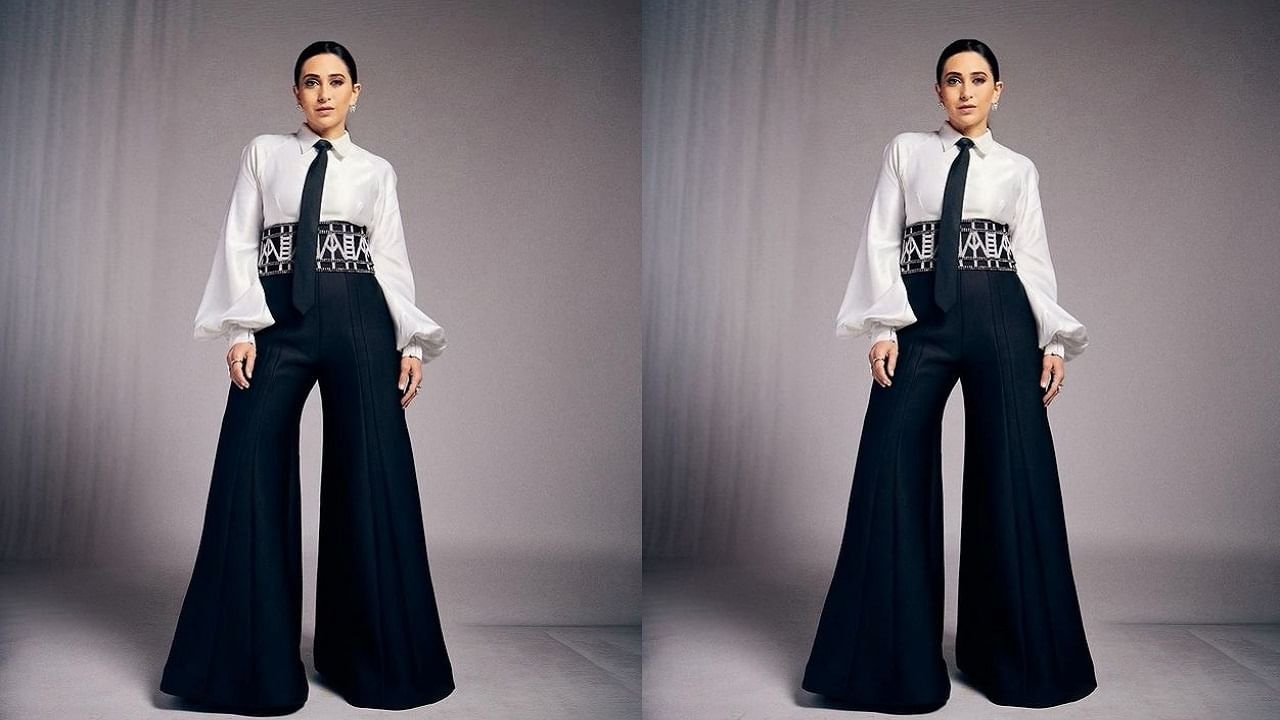 आता करिश्मा हिने पांढऱ्या रंगाचा शर्ट आणि काळ्या रंगाच्या पँटमध्ये काही फोटो पोस्ट केले आहेत. सध्या सर्वत्र फक्त आणि फक्त करिश्माच्या फोटोंची चर्चा रंगली आहे. 