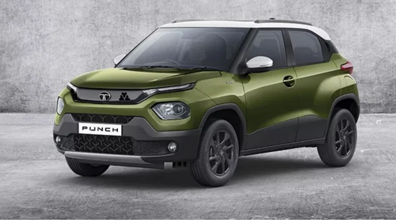 Tata Punch Camo Edition Features: या SUV च्या कॅमो एडीशनमध्ये व्हायरलेस एड्रॉईड ऑटो आणि एप्पल कारप्लेसह 10.25 इंचाचा इंफोटेन्मेंट सिस्टीम दिली आहे. यात वायरलेस चार्जिंग,रियर एसी वेंट्स आणि आर्मरेस्ट सारखे फिचर्स दिले आहेत. ( फोटो सौजन्य : टाटा मोटर्स ) 