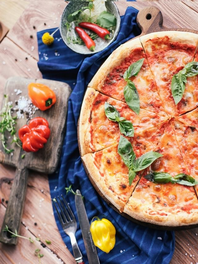 An Indian eats 1 kg 300 grams of pizza in a year
