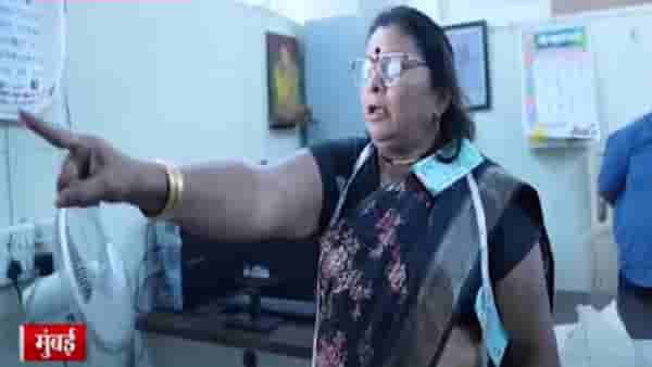 MHADA Video : ‘मला हात लावला तर उडी घेईन’, 20 वर्षांपासून गरिबांना घरं नाही असा आरोप अन् ‘म्हाडा’ मुख्यालयात उधळल्या नोटा