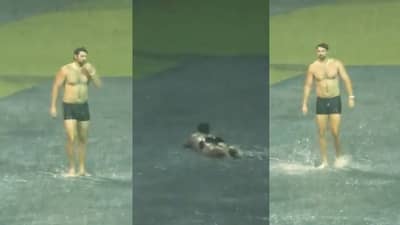 टिम डेविडने मैदानातच काढले कपडे आणि लुटला पावसाचा आनंद, चिन्नास्वामी स्टेडियम झालं स्विमिंग पूल Video