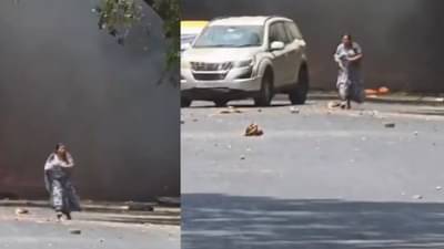 मुलास वाचवण्यासाठी आगीसोबत आईचा लढा, सोशल मीडियावरील व्हायरल व्हिडिओत मन हेलावून टाकणारा प्रसंग