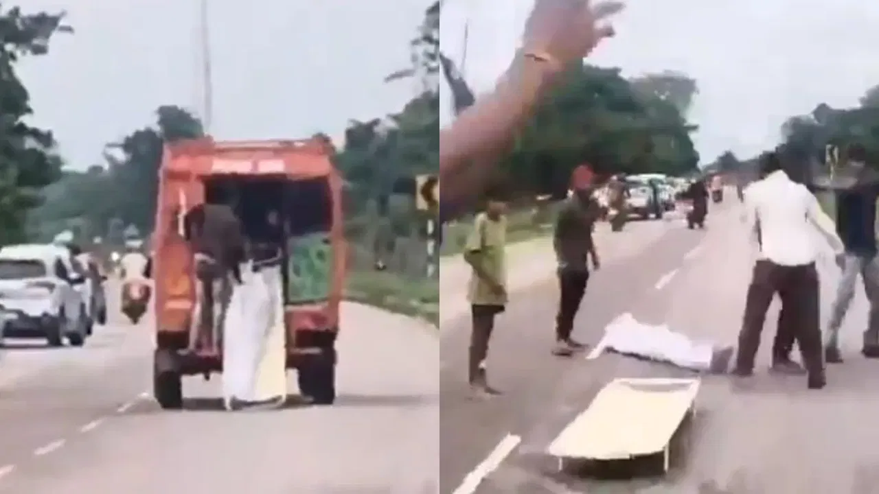 चालत्या रुग्णवाहिकेतून मृतदेह रस्त्यावर फेकला, Video व्हायरल; नेमकं काय घडलं? चालत्या रुग्णवाहिकेतून मृतदेह रस्त्यावर फेकला, Video व्हायरल; नेमकं काय घडलं?