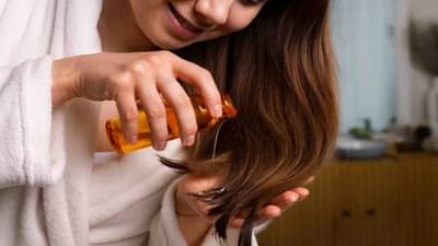 गरम तेलाने डोक्याला मालिश करणं योग्य ती अयोग्य? जाणून घ्या फायदे - तोटे