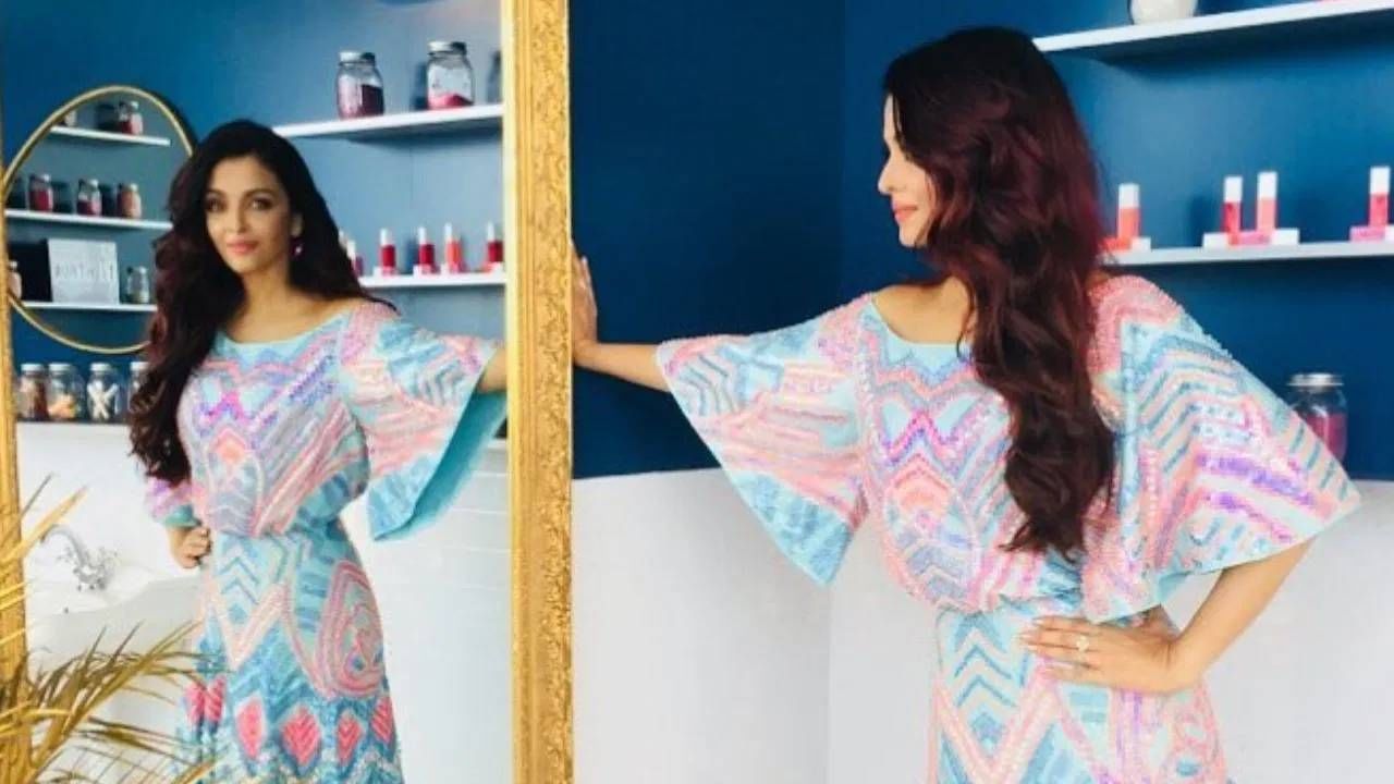 ऐश्वर्या रायचा लूक या ड्रेसमध्ये सुंदर दिसतोय. तिने रंगीबेरंगी फ्लेअर्ड लाँग ड्रेस घातला होता. ड्रेसमध्ये बोट नेकलाइन आणि अरबी-कट स्लीव्हज आहेत. 