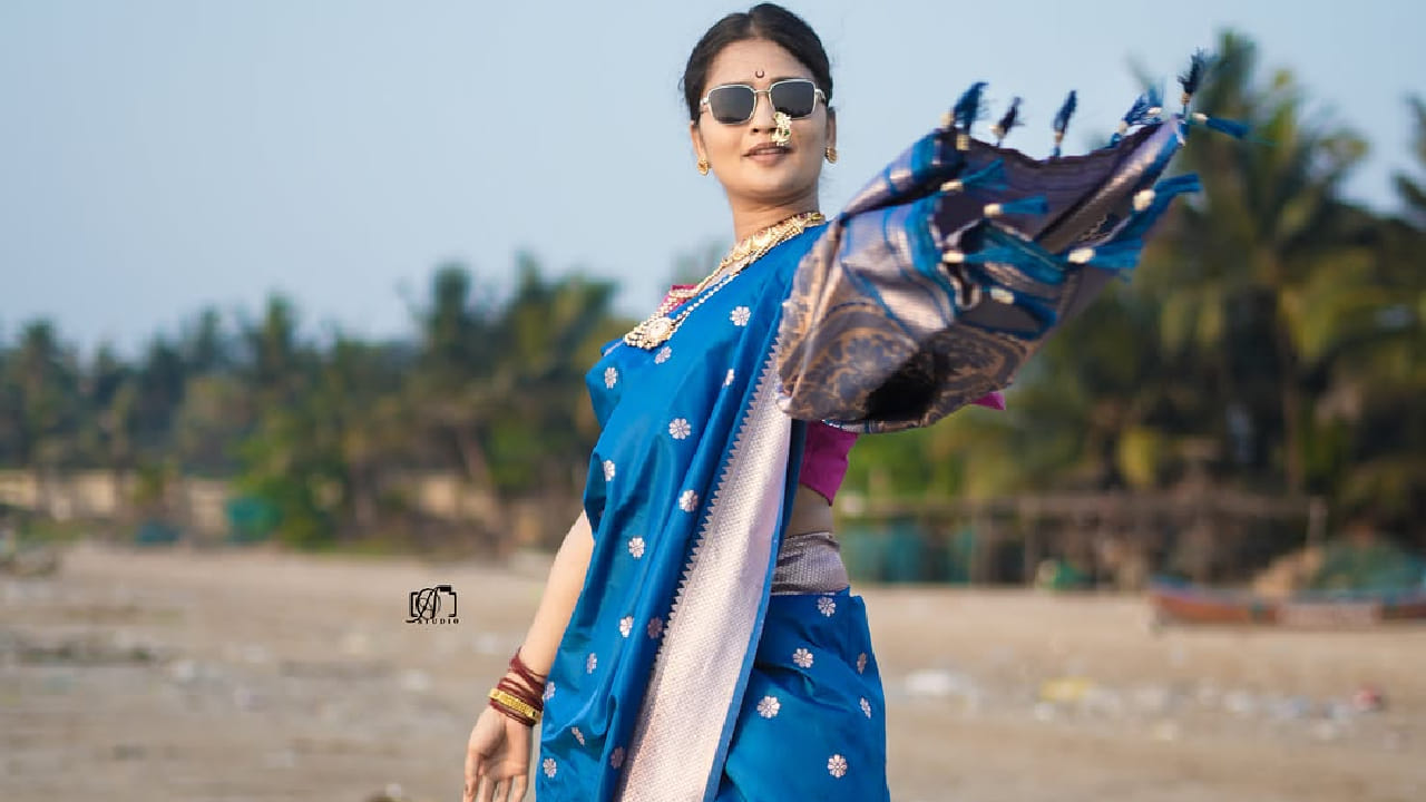गाण्यातील तिचा लुक विशेष आकर्षण ठरत आहे. मोरपंखी रंगाची नऊवारी साडी, पायात पांढरे शूज, डोळ्यांवर स्टायलिश गॉगल आणि नाकात पारंपरिक नथ असा लुक करत गौतमीने चाहत्यांना अक्षरशः भुरळ घातली आहे.