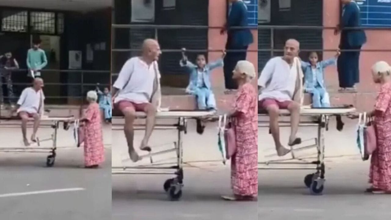 Viral Video : आजारी नवऱ्याला स्ट्रेचवरून एकटीनच ओढलं; वृद्ध महिलेचा व्हिडिओ पाहून नेटकऱ्यांचे डोळे...