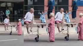 Viral Video : आजारी नवऱ्याला स्ट्रेचवरून एकटीनच ओढलं; वृद्ध महिलेचा व्हिडिओ पाहून नेटकऱ्यांचे डोळे पाणावले